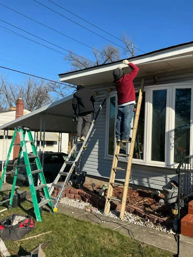 Restoration crew performing exterior repair in West Cocalico